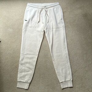 Lacoste, cream sweatpants, size large, never worn